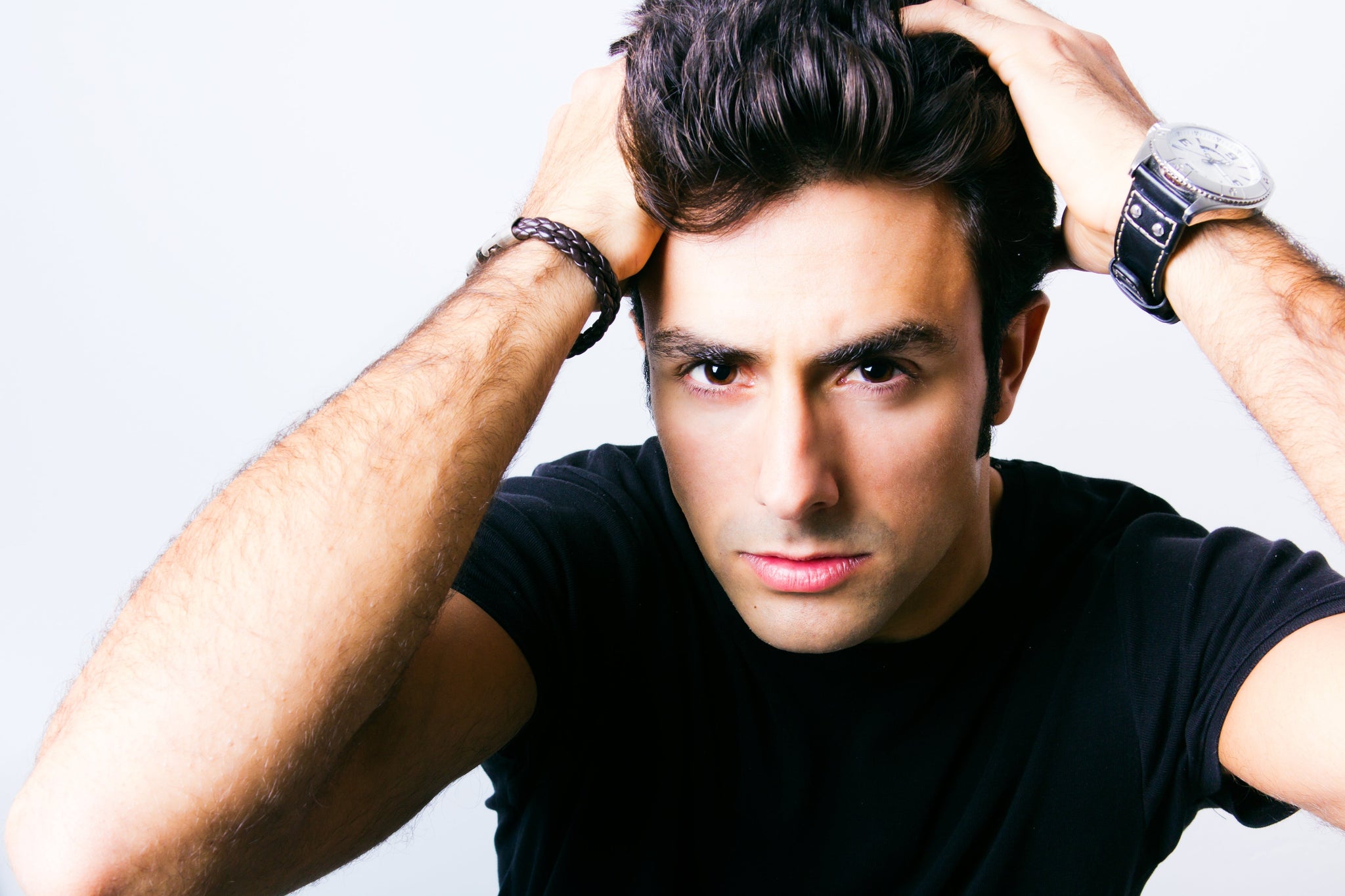 Thinning Hair in Men: Causes & Treatments